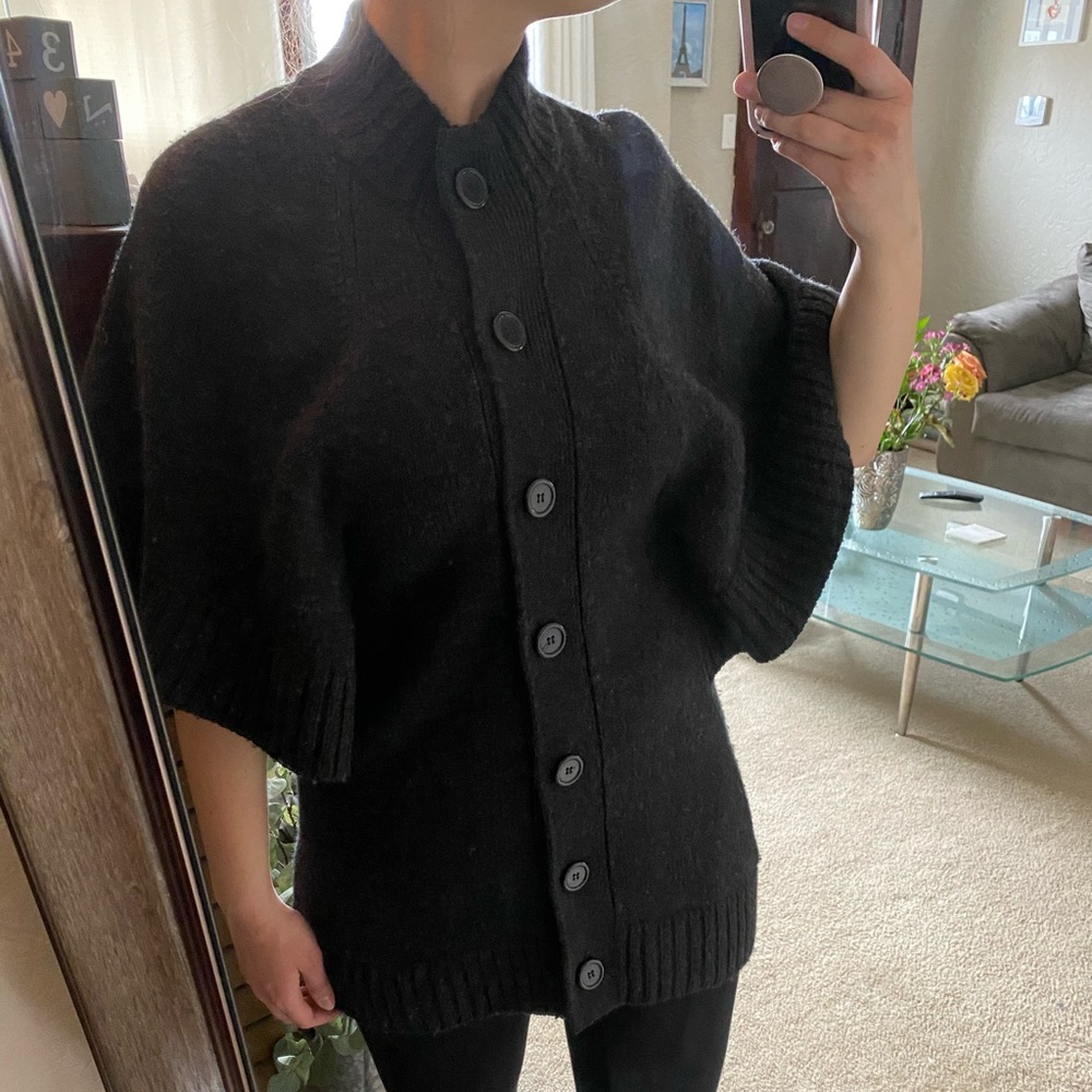 Tunic length button down sweater, look sleeves, pairs well with a long sleeve